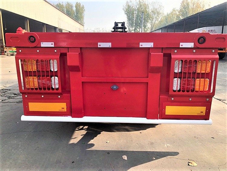 3 axle flatbed semi truck trailer rear view showing bumper and platform width 3 axle flatbed semi truck trailer rear view showing bumper and platform width