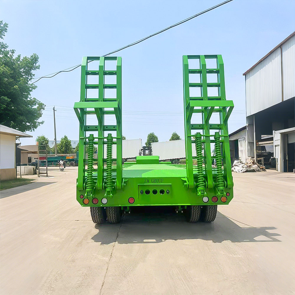 3 axle lowbed semi trailer rear view showing reinforced loading ramps for excavator and machinery
