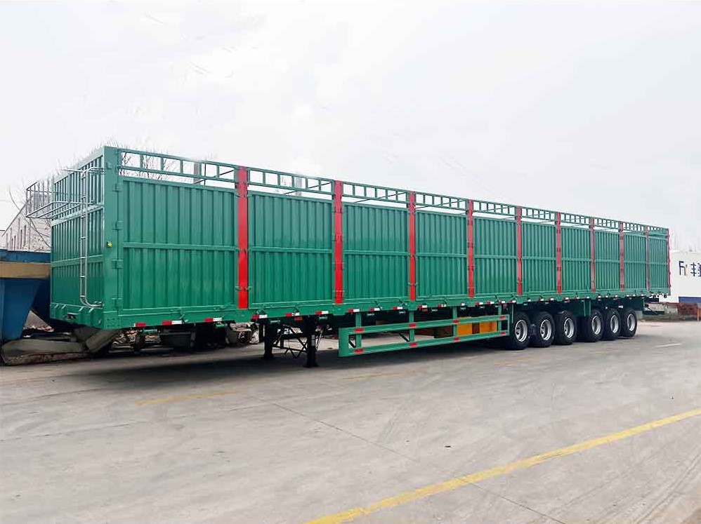 Side View 6 axle 100 ton fence semi trailer side view showing long cargo platform and removable fence panels