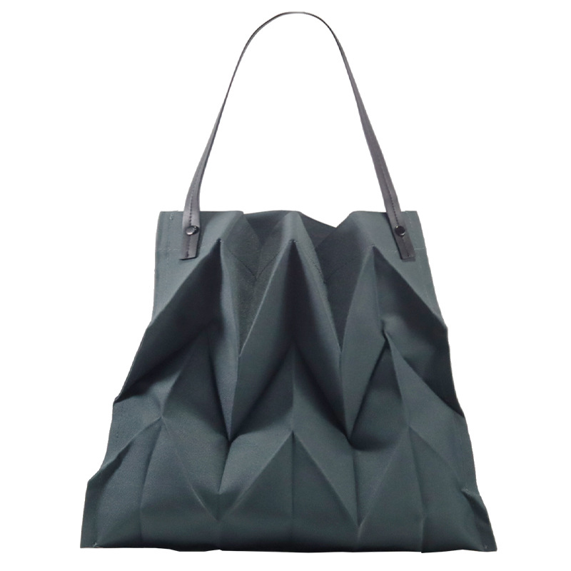2025 Japanese and Korean pleated women's bag simple and lightweight folding canvas bag fashionable and artistic niche design hand-held shopping bag