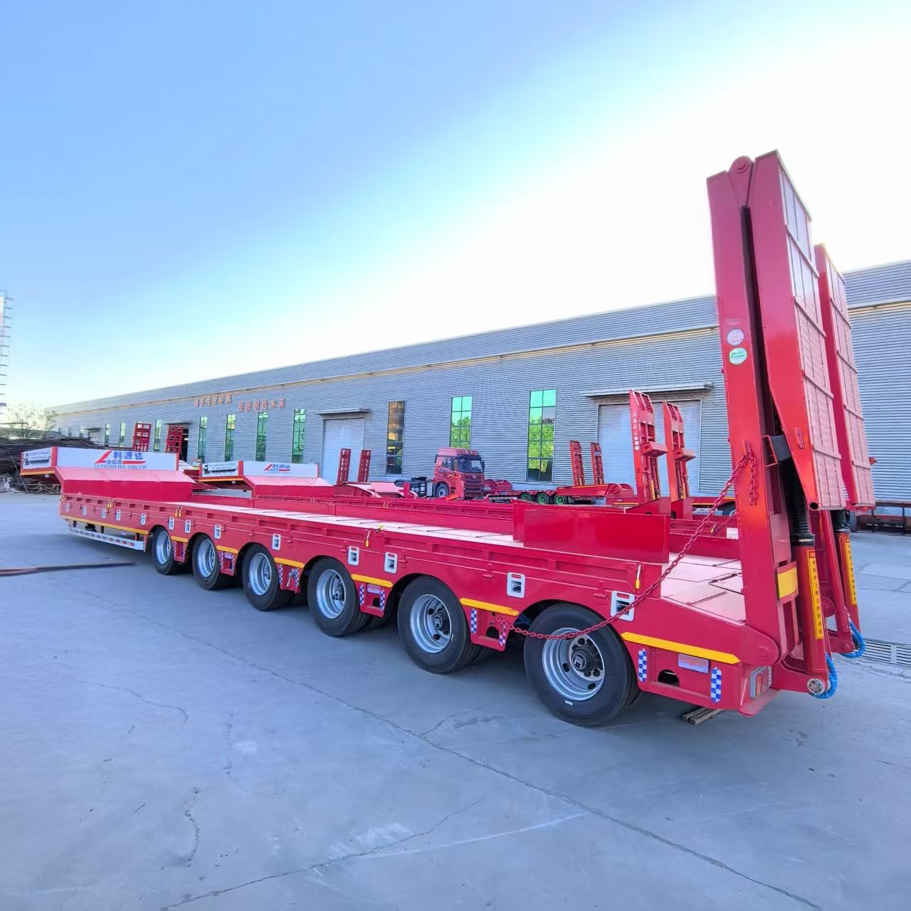 6 Axle 120 Tons Heavy Duty Lowboy Loader Low Bed Semi Trailer with Double Section Hydraulic Ladder 6 Axle 120 Tons Heavy Duty Lowboy Loader Low Bed Semi Trailer with Double Section Hydraulic Ladder