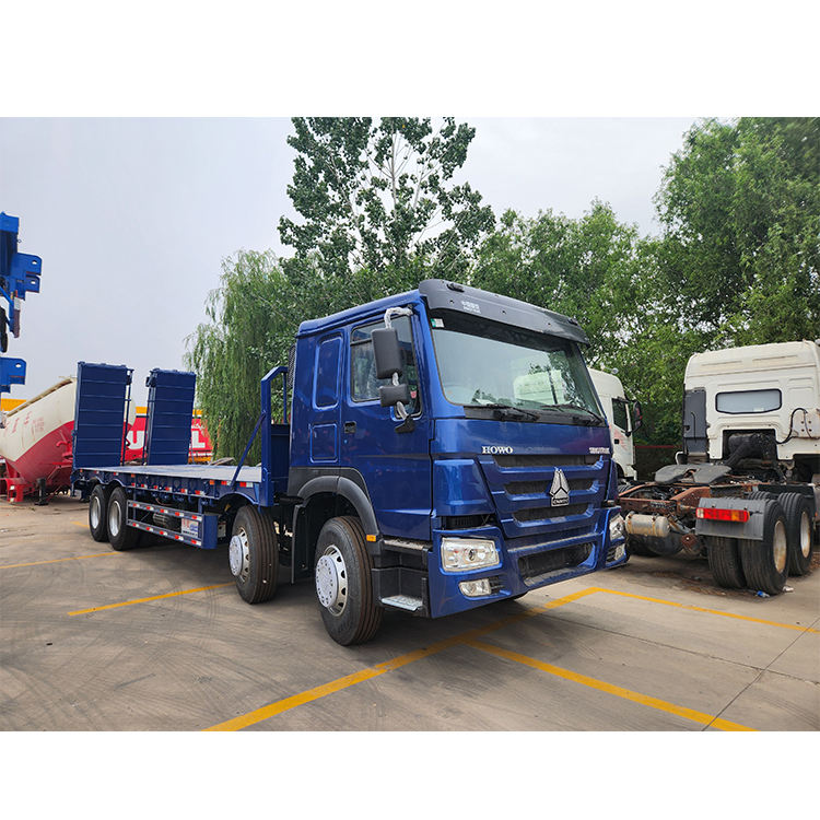 flatbed truck Howo 8x4 for heavy machinery transport flatbed truck Howo 8x4 for heavy machinery transport