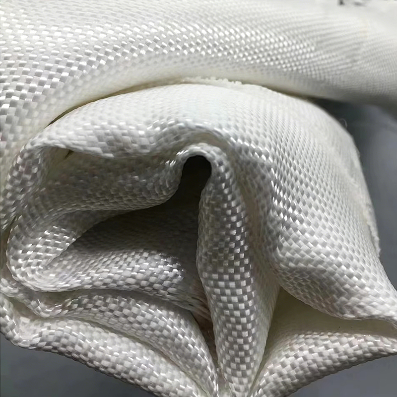 Long-filament woven geotextile