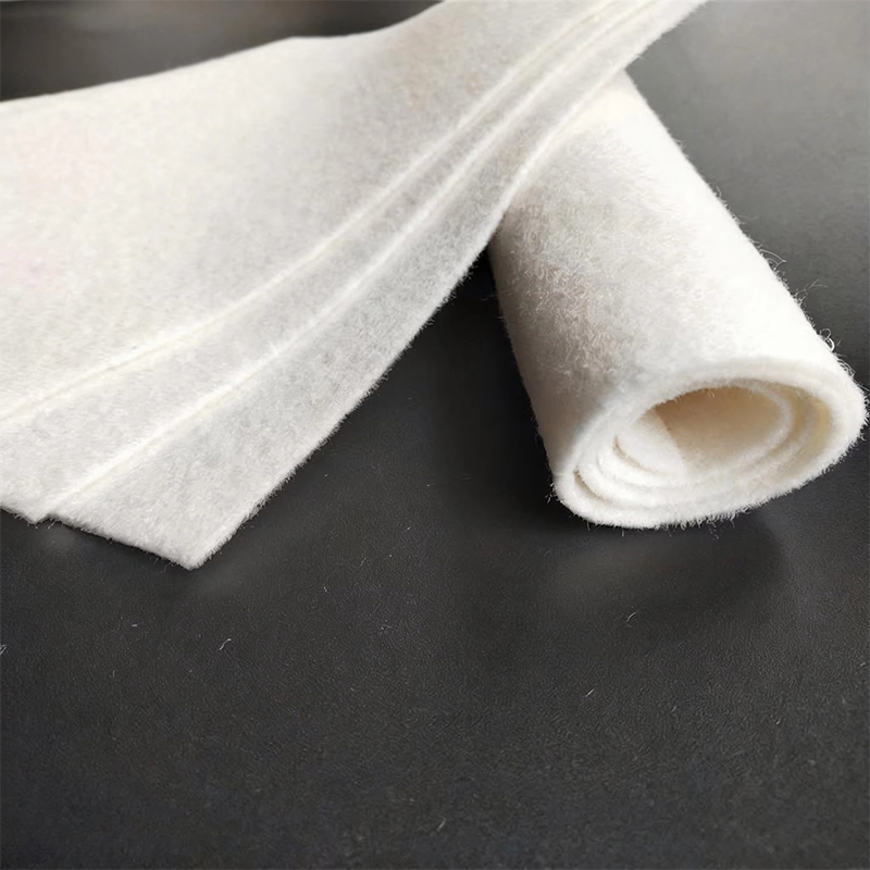 Short-fiber needle-punched nonwoven geotextile