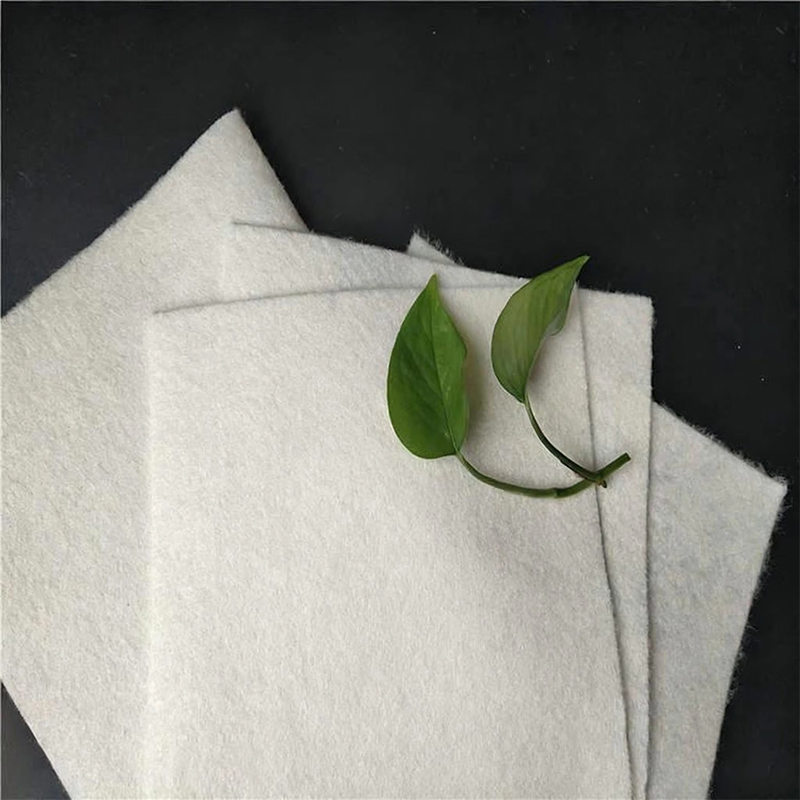 Short-fiber needle-punched nonwoven geotextile