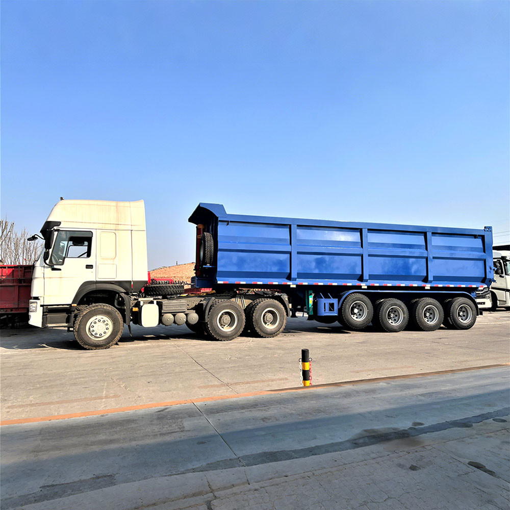 Semi-remorque à benne basculante arrière 4 essieux 40 m³ pour la construction