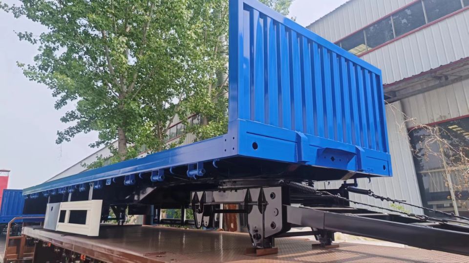 3 axle drawbar dump trailer front three quarter view highlighting drawbar connection and tri axle layout Remolque Volquete de 3 Ejes con Barra de Tiro de Alta Resistencia