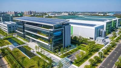 When does sustainable construction lower total building costs?
