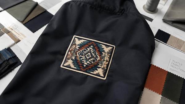 Are damask woven patches suitable for detailed garment branding?