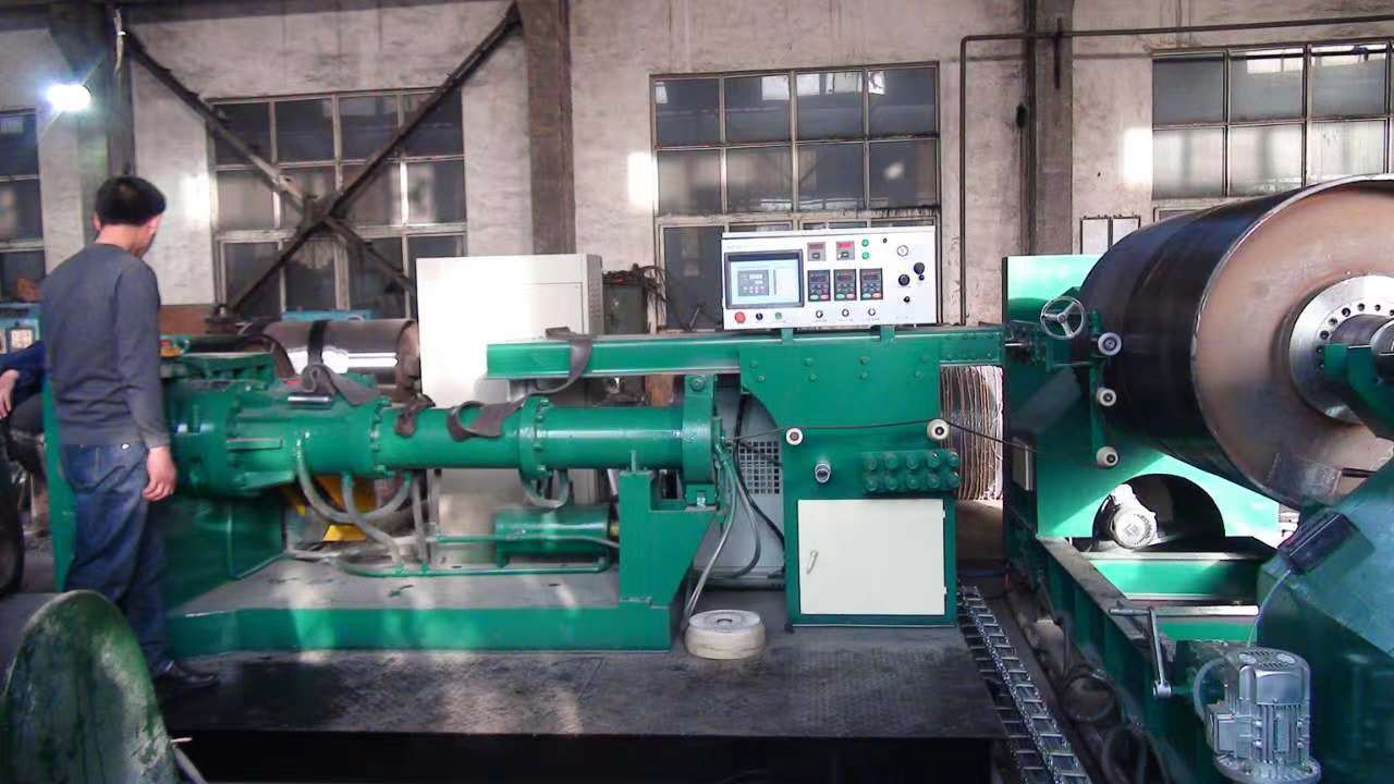 Thailand customer intended to order rubber roller winding machine