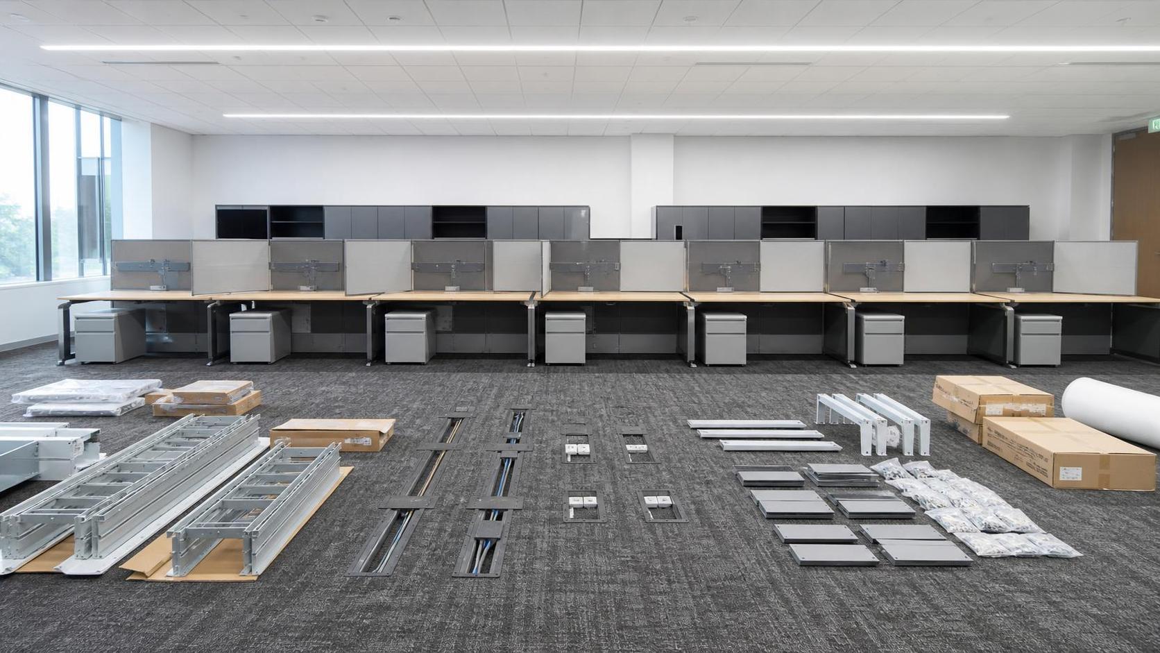 What should installation plans cover for modular systems furniture?