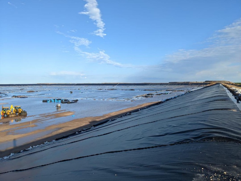 Channels, Small Dams and Other Containment Structures with Low Permeability Geomembrane Liner