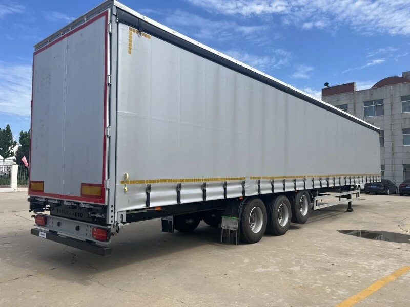Under the Curtain: Daily Notes from a Curtain-Side Driver