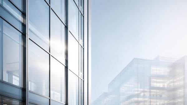 Does low e architectural glass really cut cooling costs in office buildings?