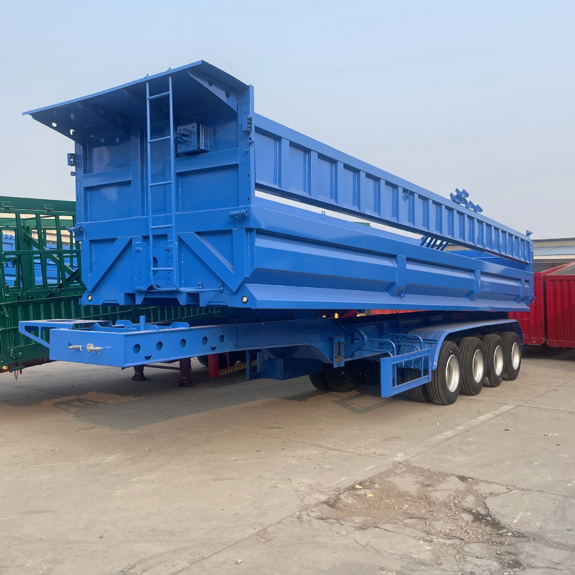 Semi-remorque benne en U d'occasion à 3 essieux 80 tonnes