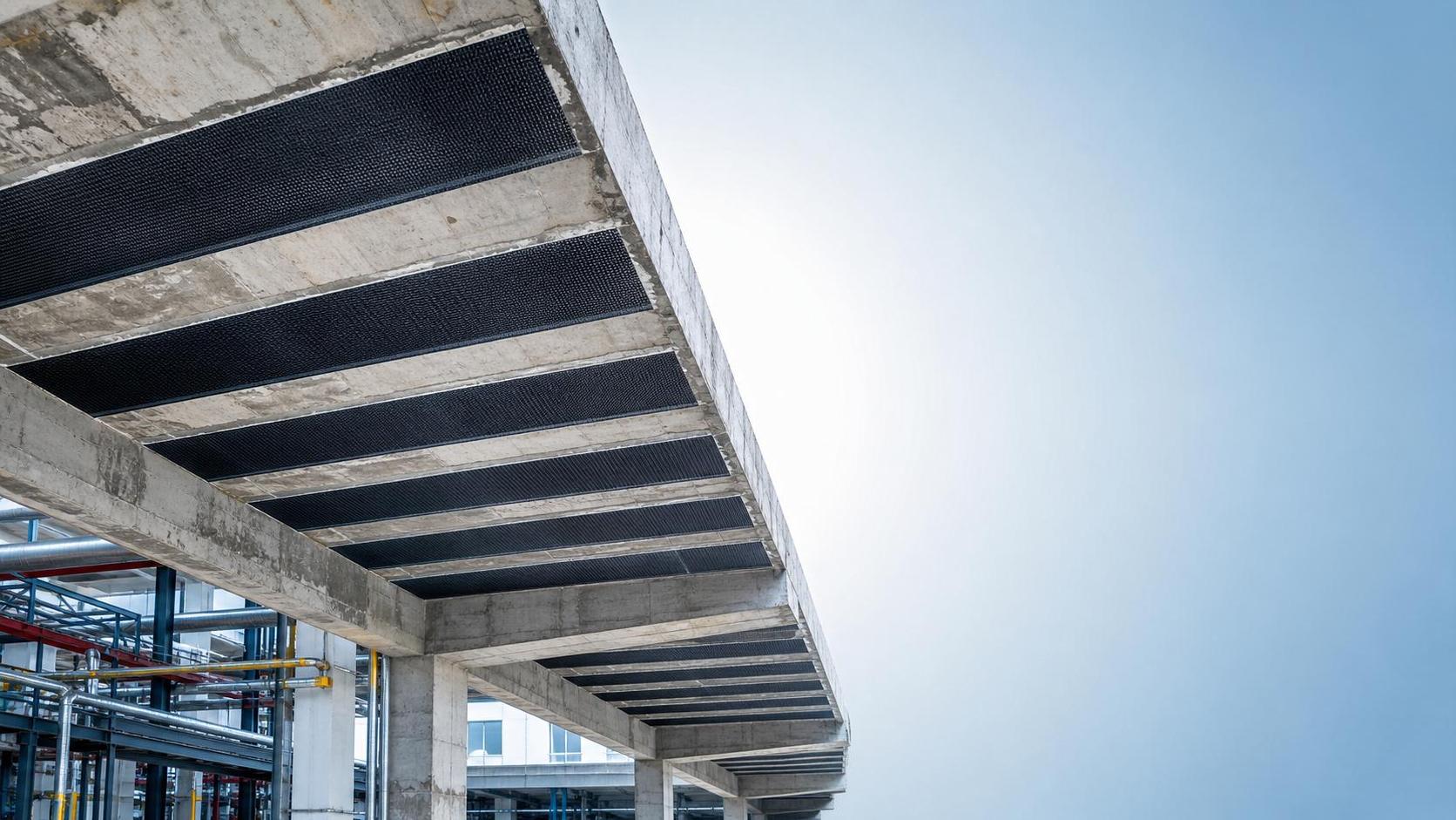Carbon-Fiber Reinforcement for Slabs: When CFRP Wraps Beat Full Replacement