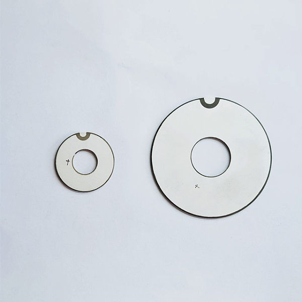 How do piezoelectric ceramics convert voltage into motion?