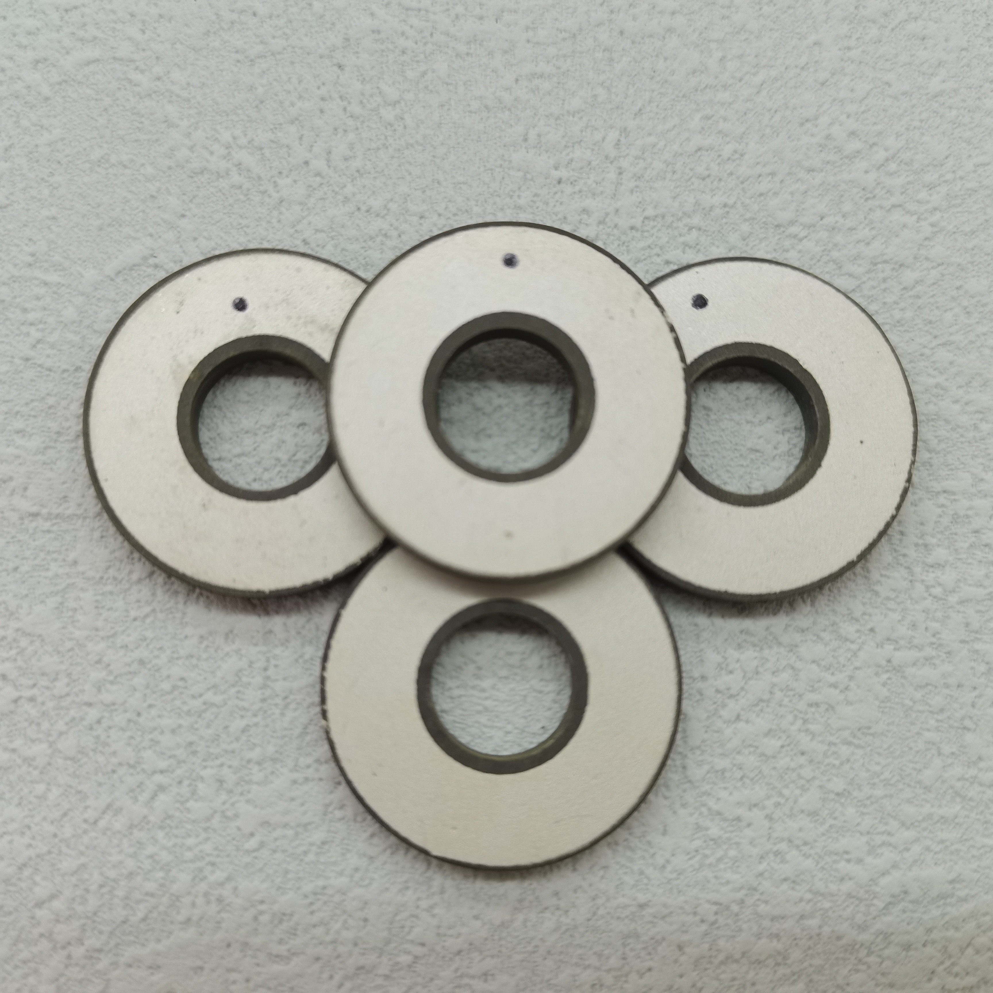 Hard vs. Soft PZT: Choosing Piezoelectric Ceramic Components by Load Profile