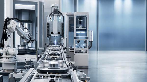 Integrated Digital Manufacturing Systems: When Integration Reduces Downtime