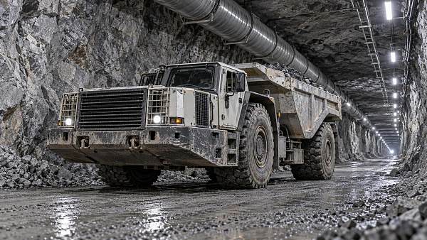 What should be verified before purchasing a used mining dump truck for underground operations?