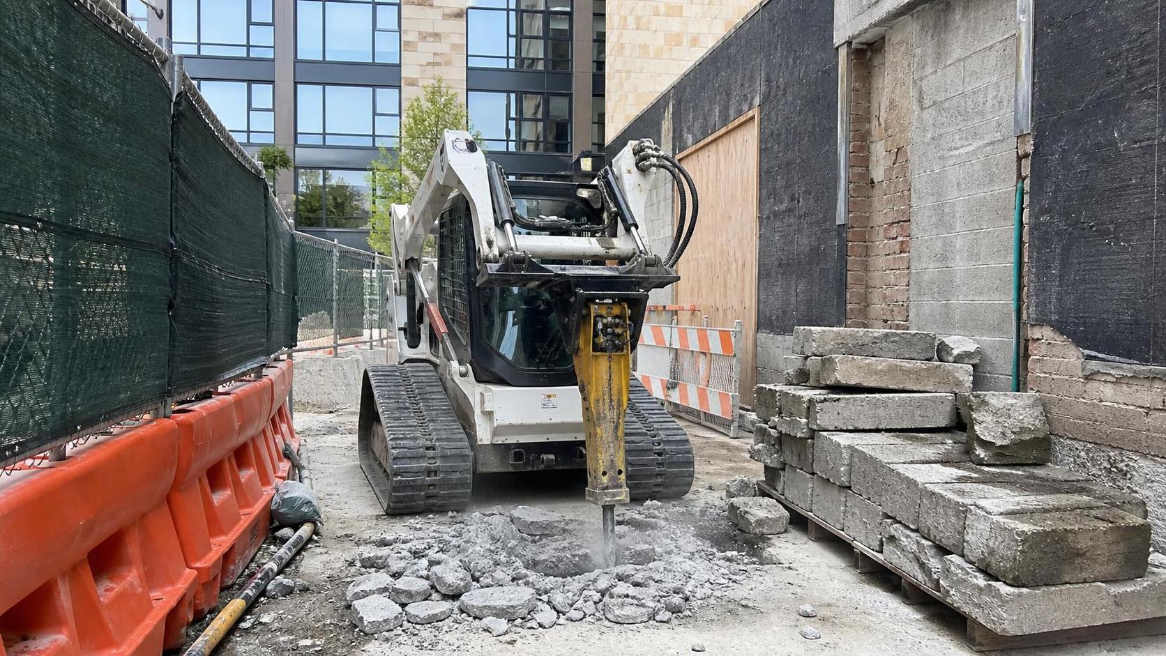 Can Skid Steer Attachments Break Concrete in Tight Spaces?