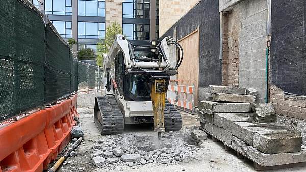Can Skid Steer Attachments Break Concrete in Tight Spaces?